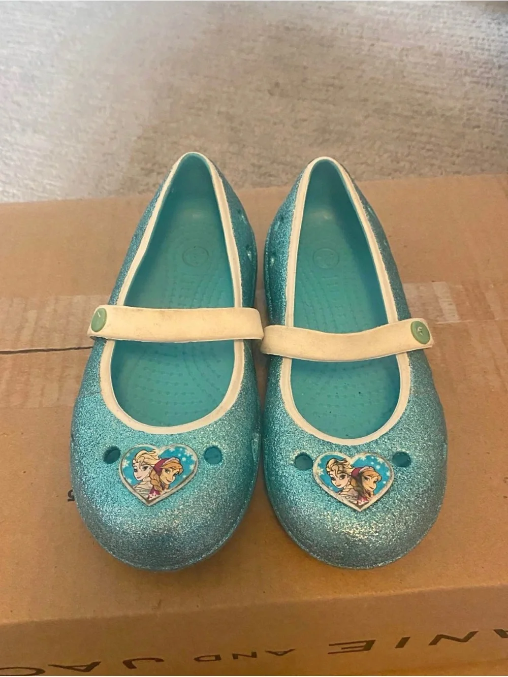 Girls Glitter Blue Crocs with Elsa & Anna Accent